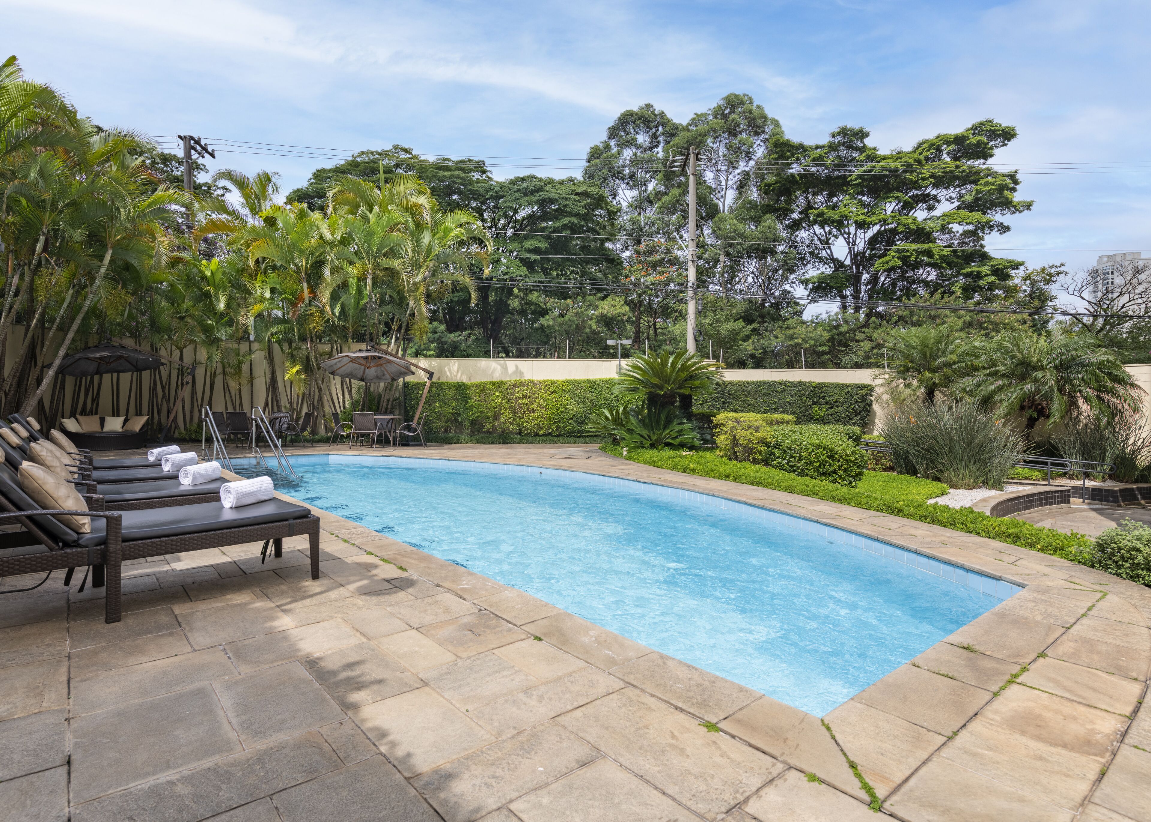 outdoor pool, pool loungers