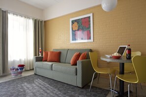 Suite, 1 Bedroom | Living area | TV, DVD player - Starlux Hotel (Wildwood)