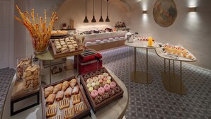A buffet with various pastries and desserts. - Boutique Hotel BOOKQUET (Prague)