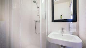 Shower, eco-friendly toiletries, towels