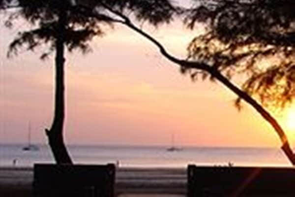 On the beach, sun-loungers, beach bar