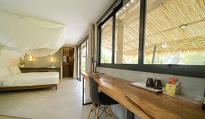 A beachfront view mini suite with a bed, a desk, and a chair. - Costa Lanta - Adult Only (Ko Lanta)