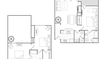 Plano de planta de un hotel que muestra una amplia sala de estar, un comedor independiente y una cocina.