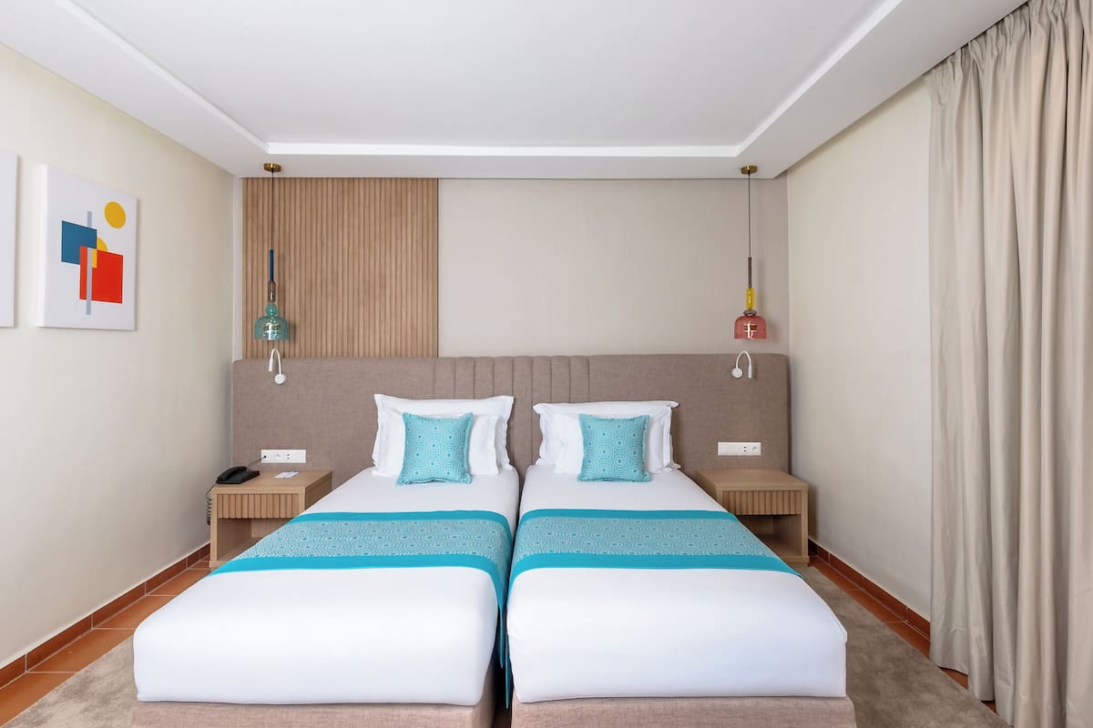 Biancheria da letto di alta qualità, minibar, una scrivania