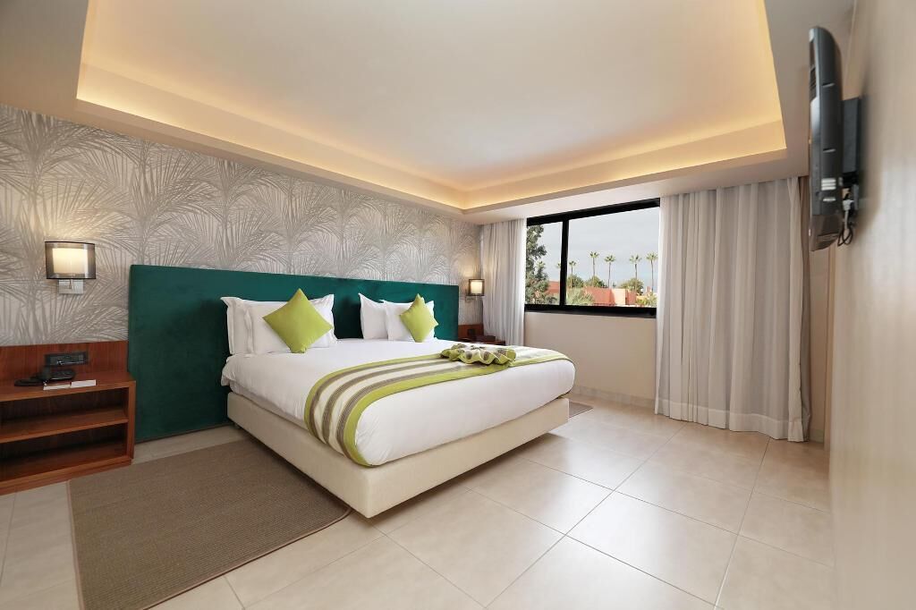 Ropa de cama de alta calidad y minibar 