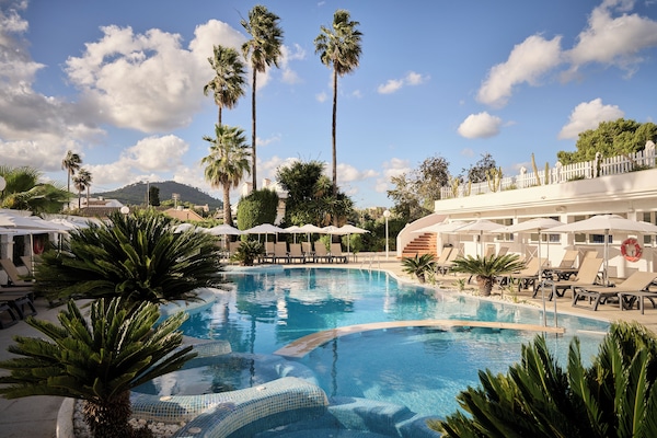 Indoor pool, outdoor pool, pool umbrellas, sun loungers