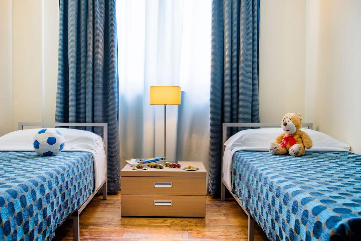 Habitación familiar | Ropa de cama hipoalergénica y minibar