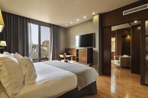 Luxe beddengoed, een minibar, een kluis op de kamer, een bureau