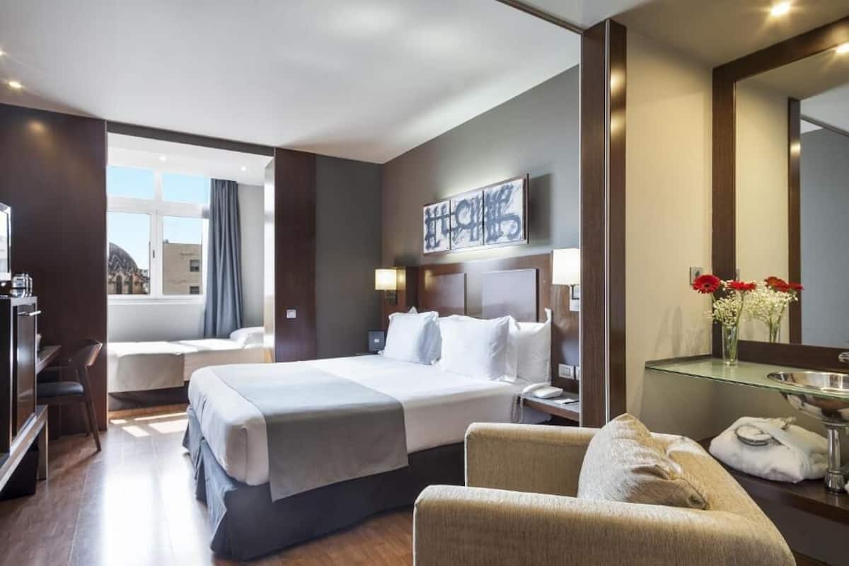 Ropa de cama de alta calidad y minibar
