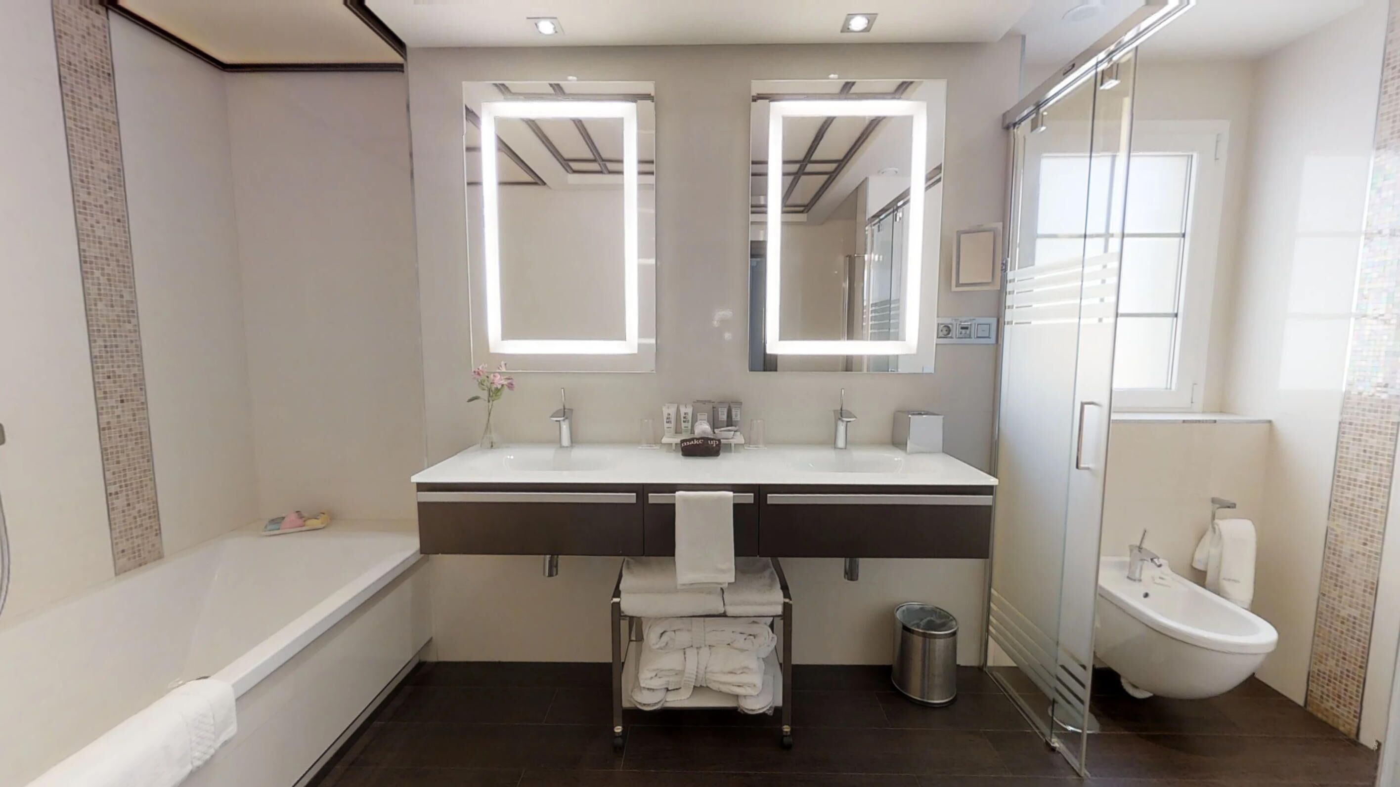 separate bathtub and shower, rainfall showerhead, hair dryer, bathrobes