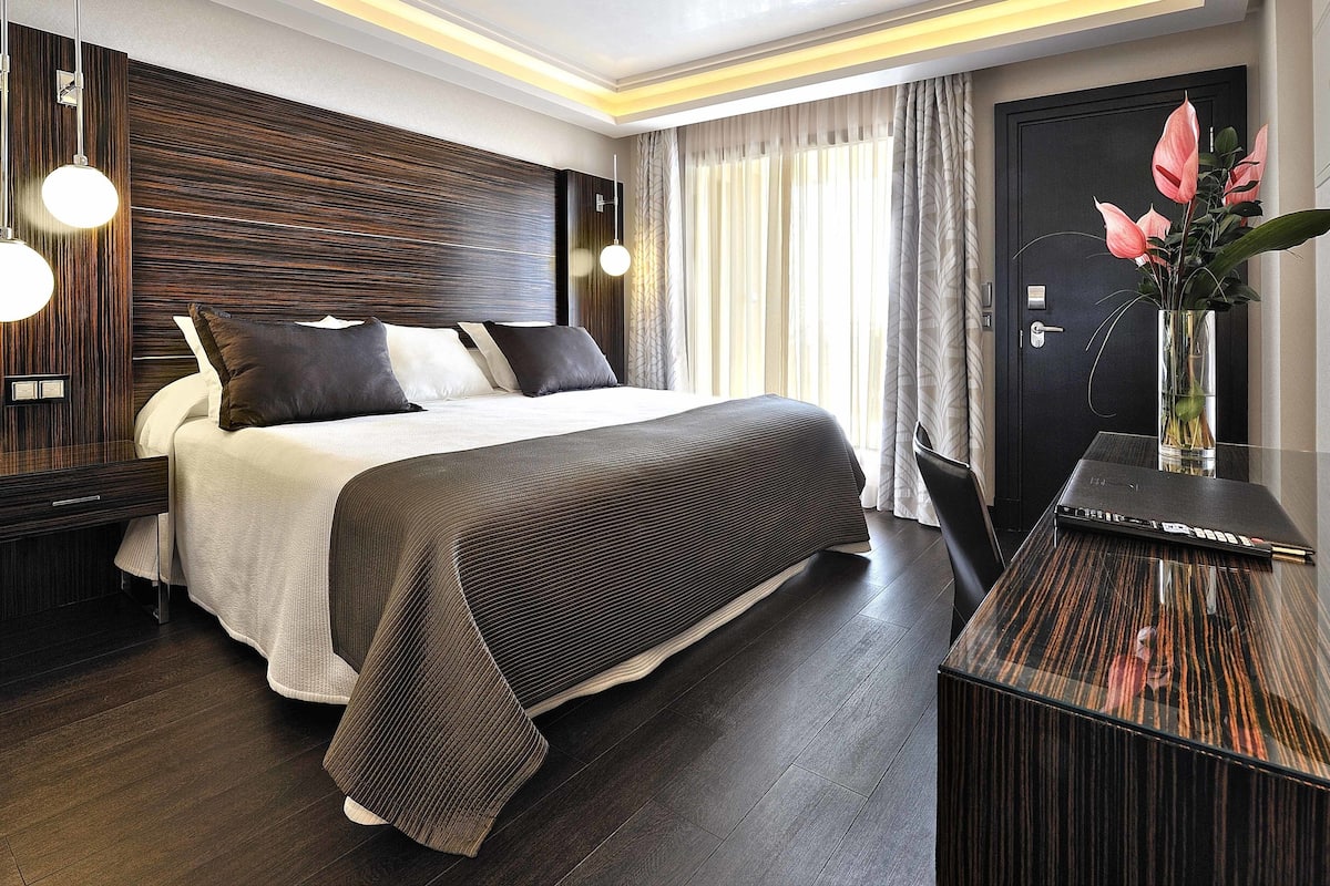 Hochwertige Bettwaren, Daunenbettdecken, Minibar, Zimmersafe