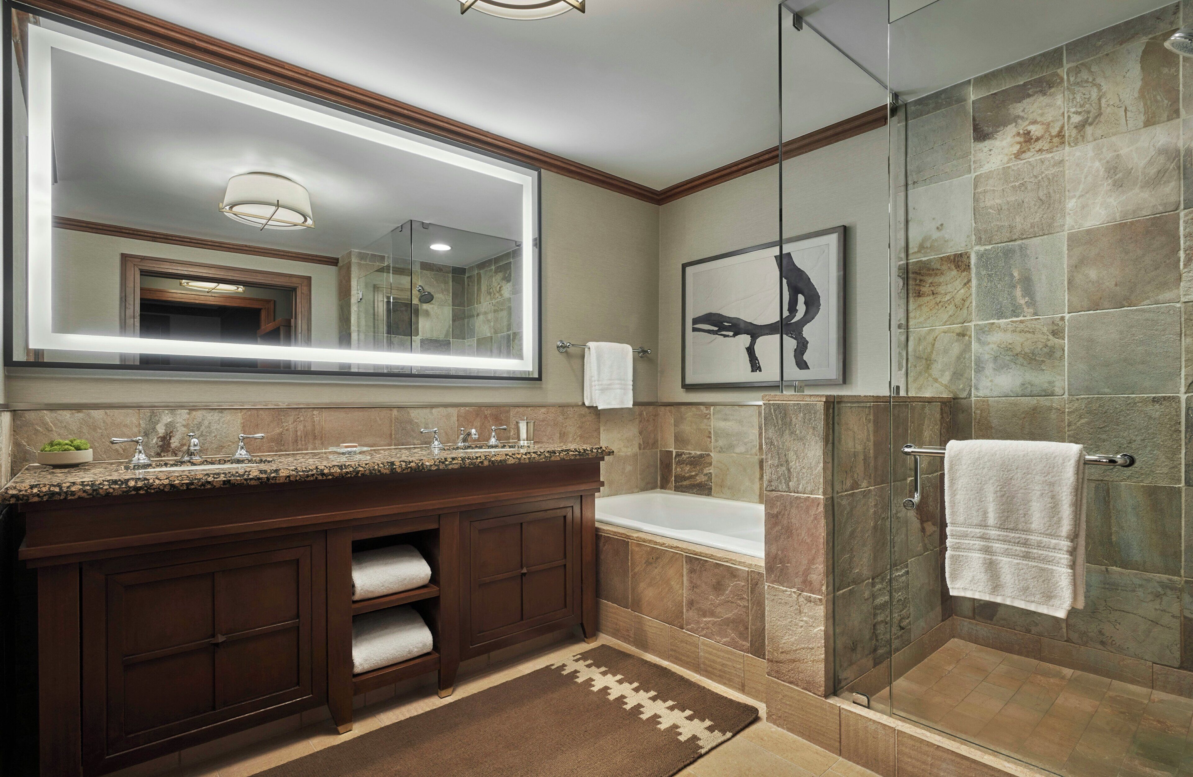 Separate tub and shower, designer toiletries, hair dryer, bathrobes