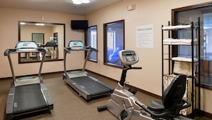 A fitness center with treadmills, an elliptical, and a stationary bike. - Holiday Inn Express Hotel & Suites Kingman by IHG (Kingman)