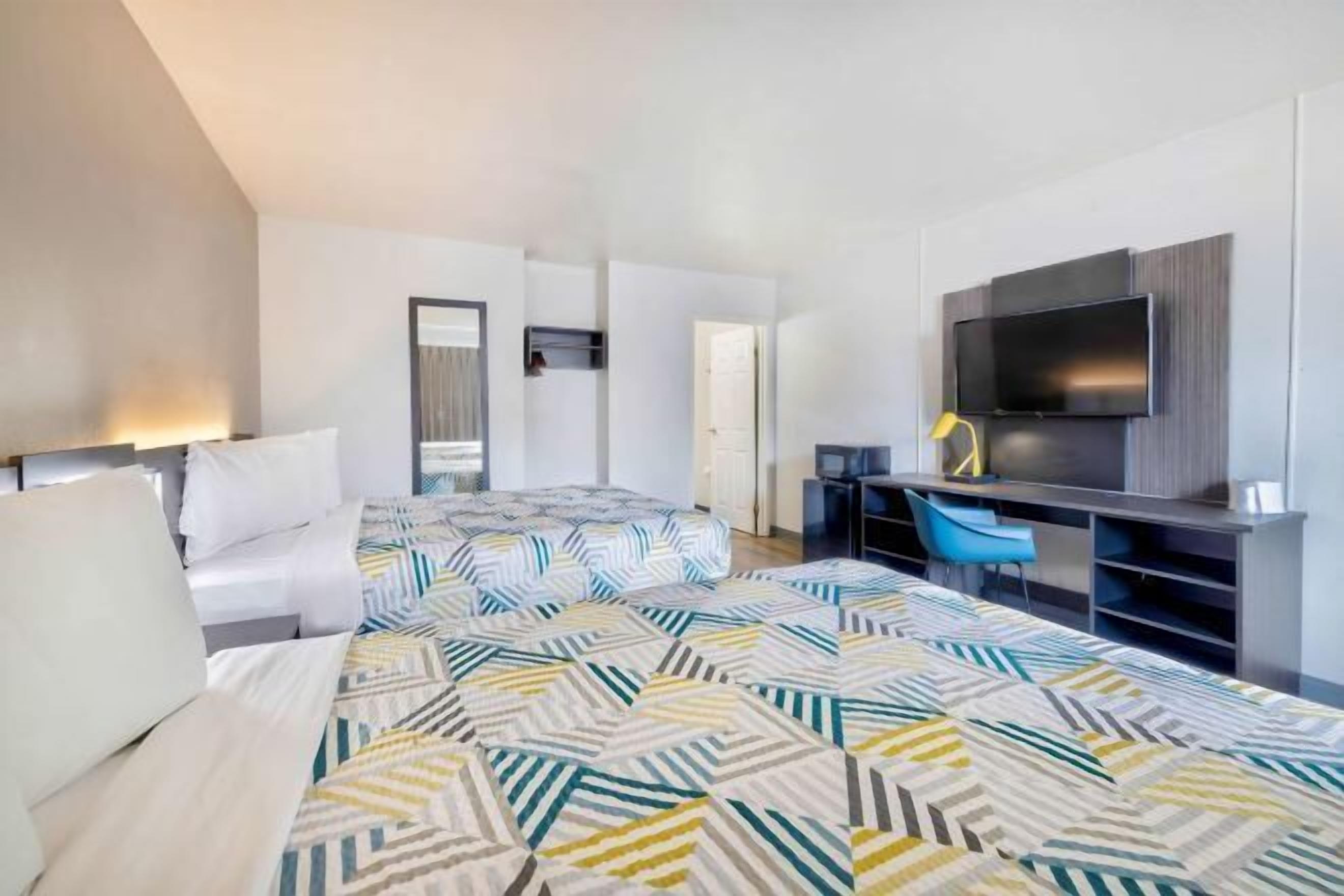 Desk, laptop workspace, free WiFi, bed sheets