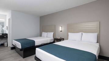 Escrivaninha, cortinas blackout, Wi-Fi de cortesia, roupa de cama