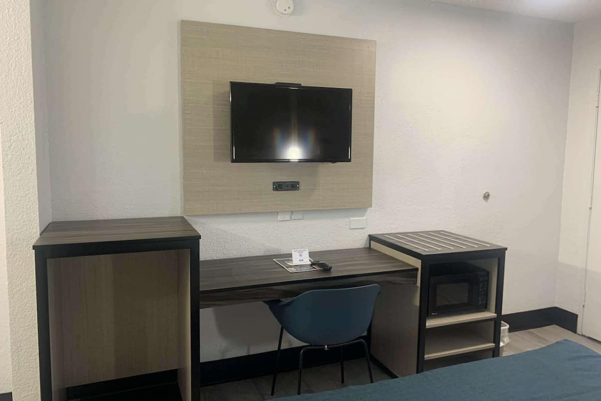 Desk, blackout curtains, free WiFi, bed sheets