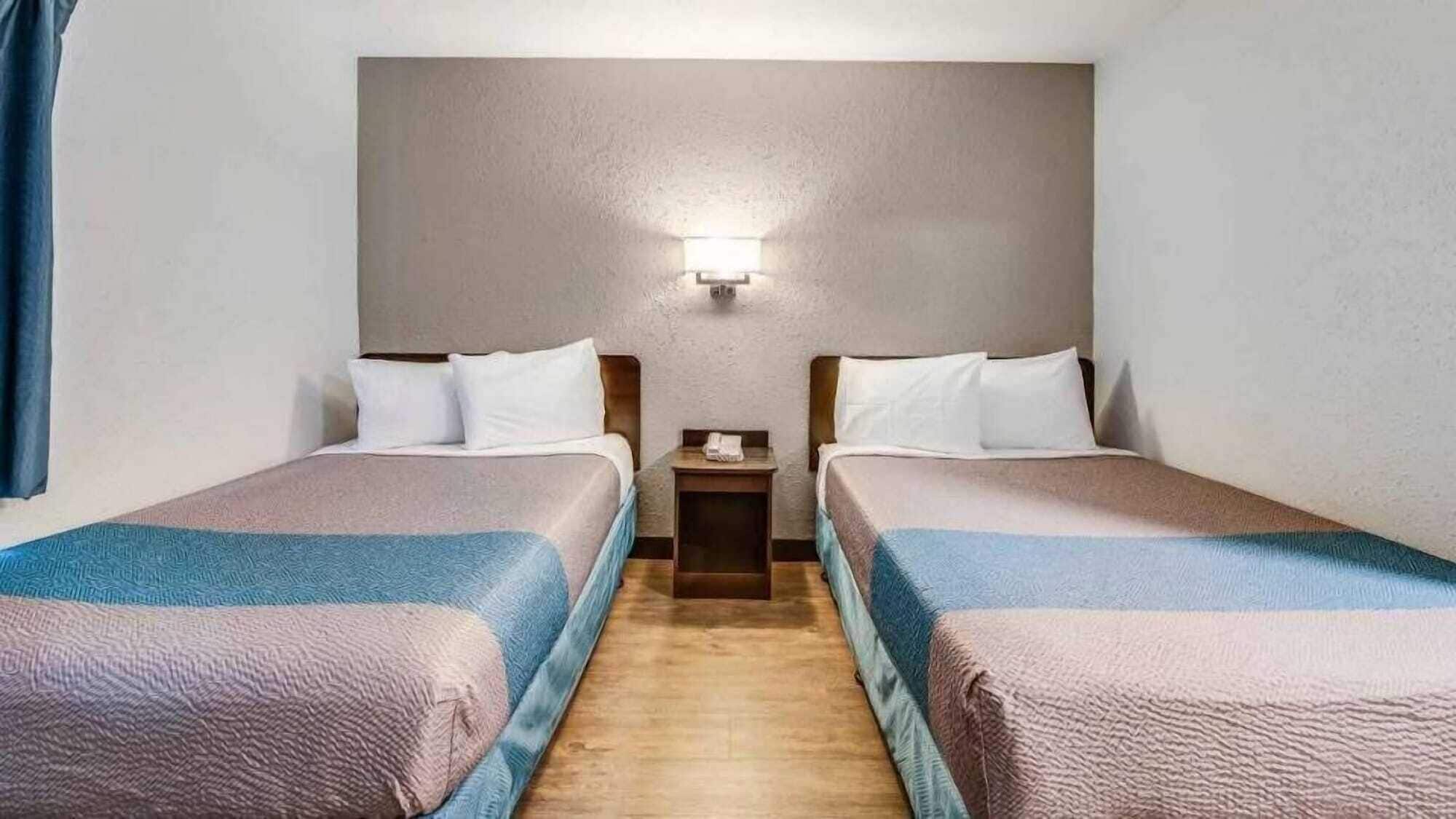 Desk, laptop workspace, blackout curtains, iron/ironing board