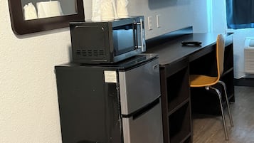 Desk, laptop workspace, blackout curtains, iron/ironing board