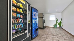 A vending machine area with snacks and a drink dispenser. - Motel 6 Alamogordo, NM (Alamogordo)