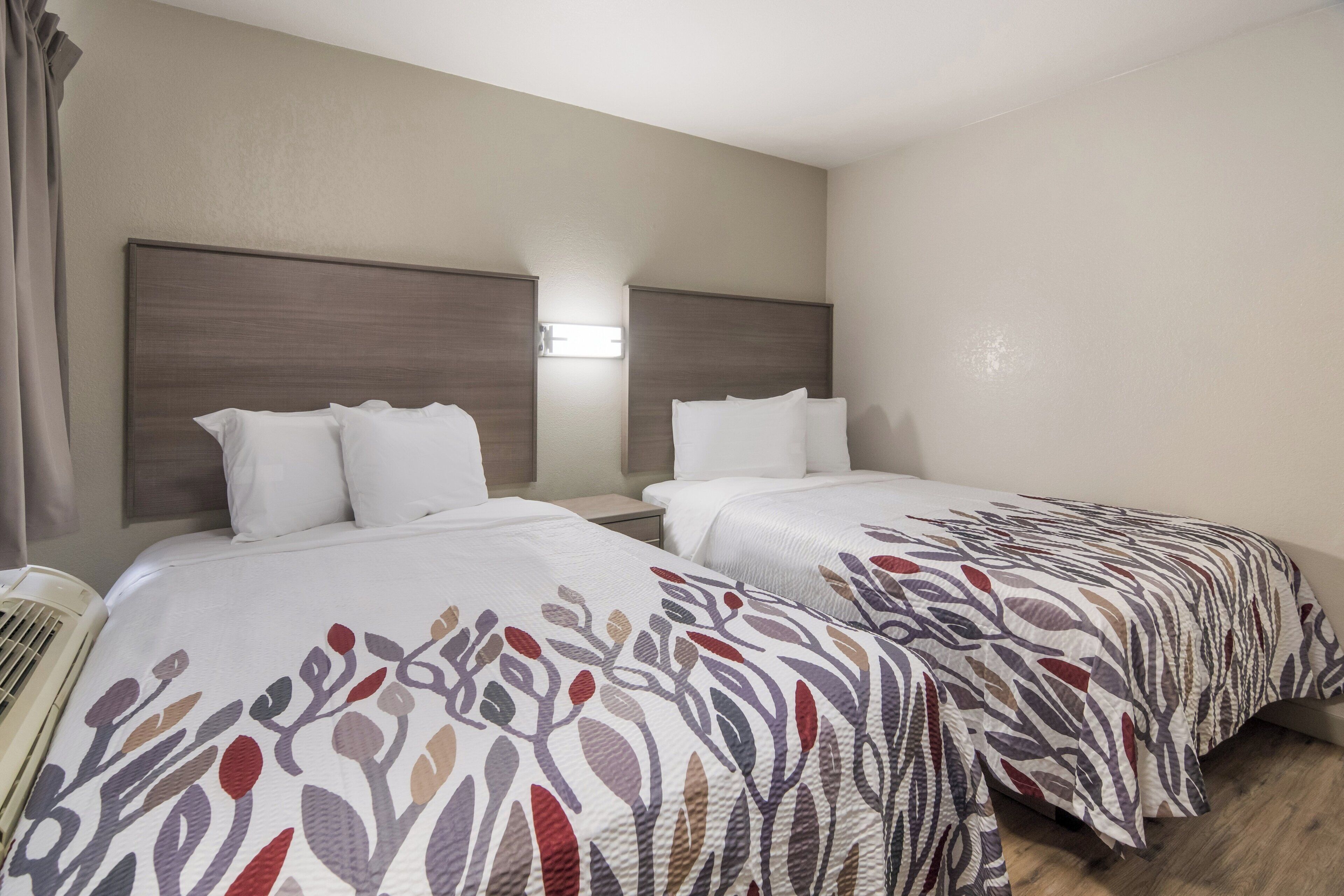Desk, blackout curtains, free cots/infant beds, free WiFi