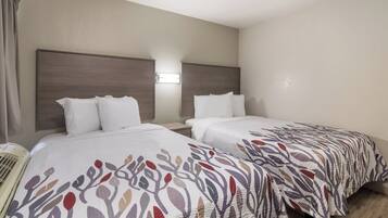 Desk, blackout curtains, free cots/infant beds, free WiFi