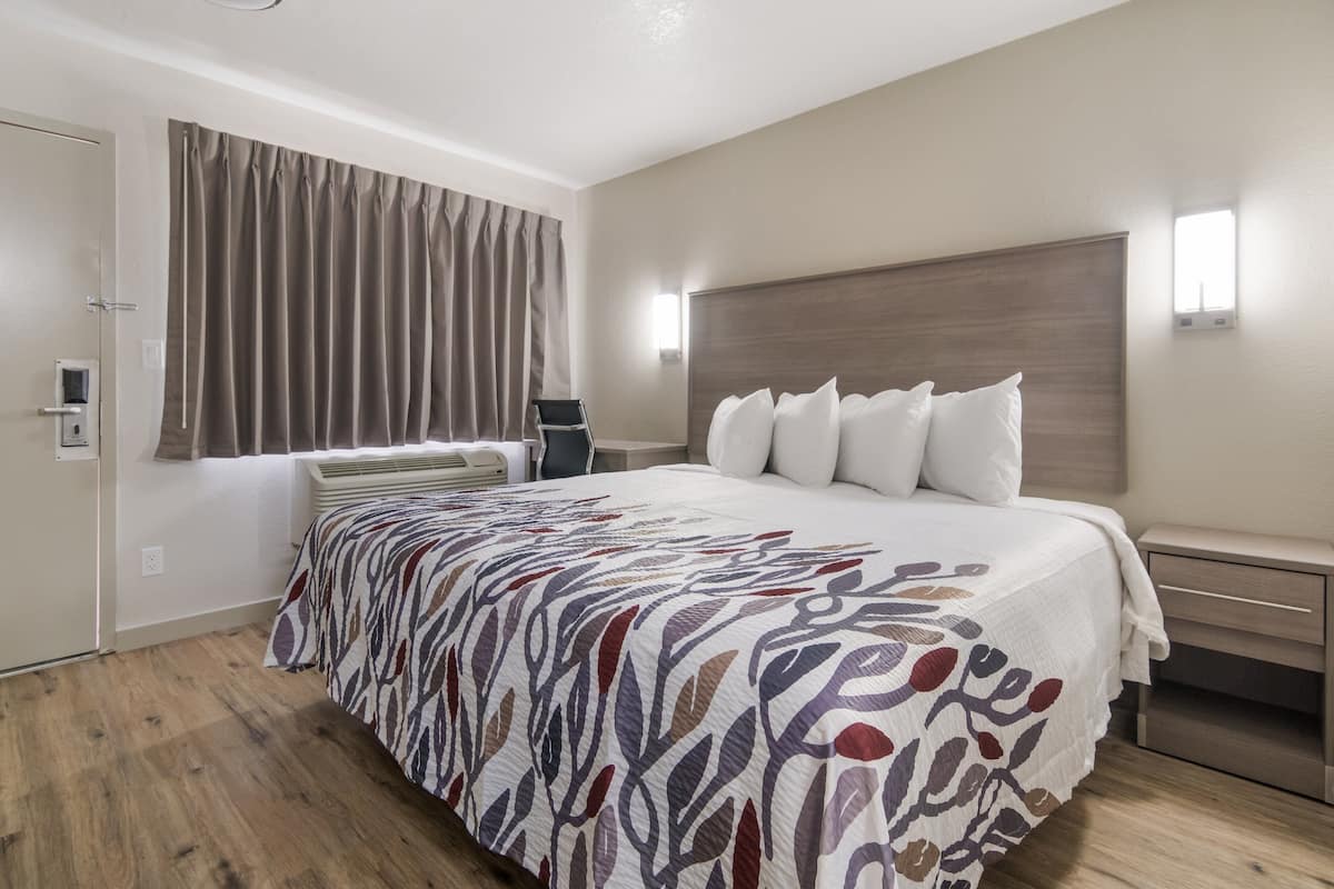 Desk, blackout curtains, free cots/infant beds, free WiFi