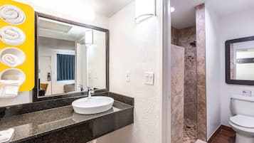 Shower, rainfall showerhead, towels