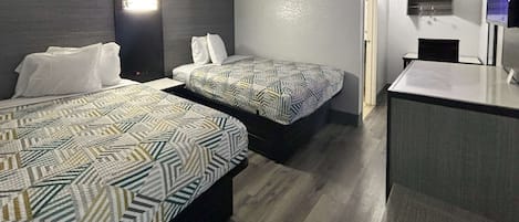 Escritorio, wifi gratis y ropa de cama