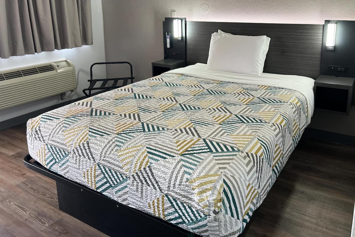 Cortinas blackout, wifi gratis y ropa de cama