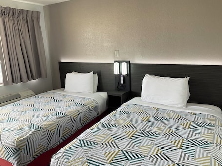 Cortinas blackout, wifi gratis y ropa de cama