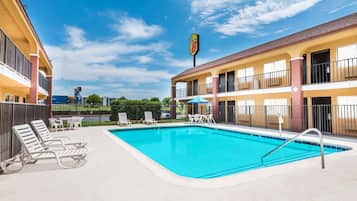 Seasonal outdoor pool, open 9:00 AM to 9:30 PM, pool umbrellas