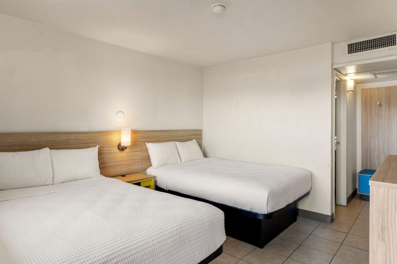 Room, 2 Double Beds, Non Smoking | Desk, laptop workspace, free WiFi, bed sheets