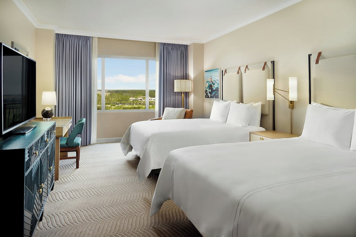 Premium bedding, down comforters, in-room safe, desk