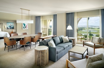 Premium bedding, down comforters, in-room safe, desk at Omni Orlando Resort at ChampionsGate