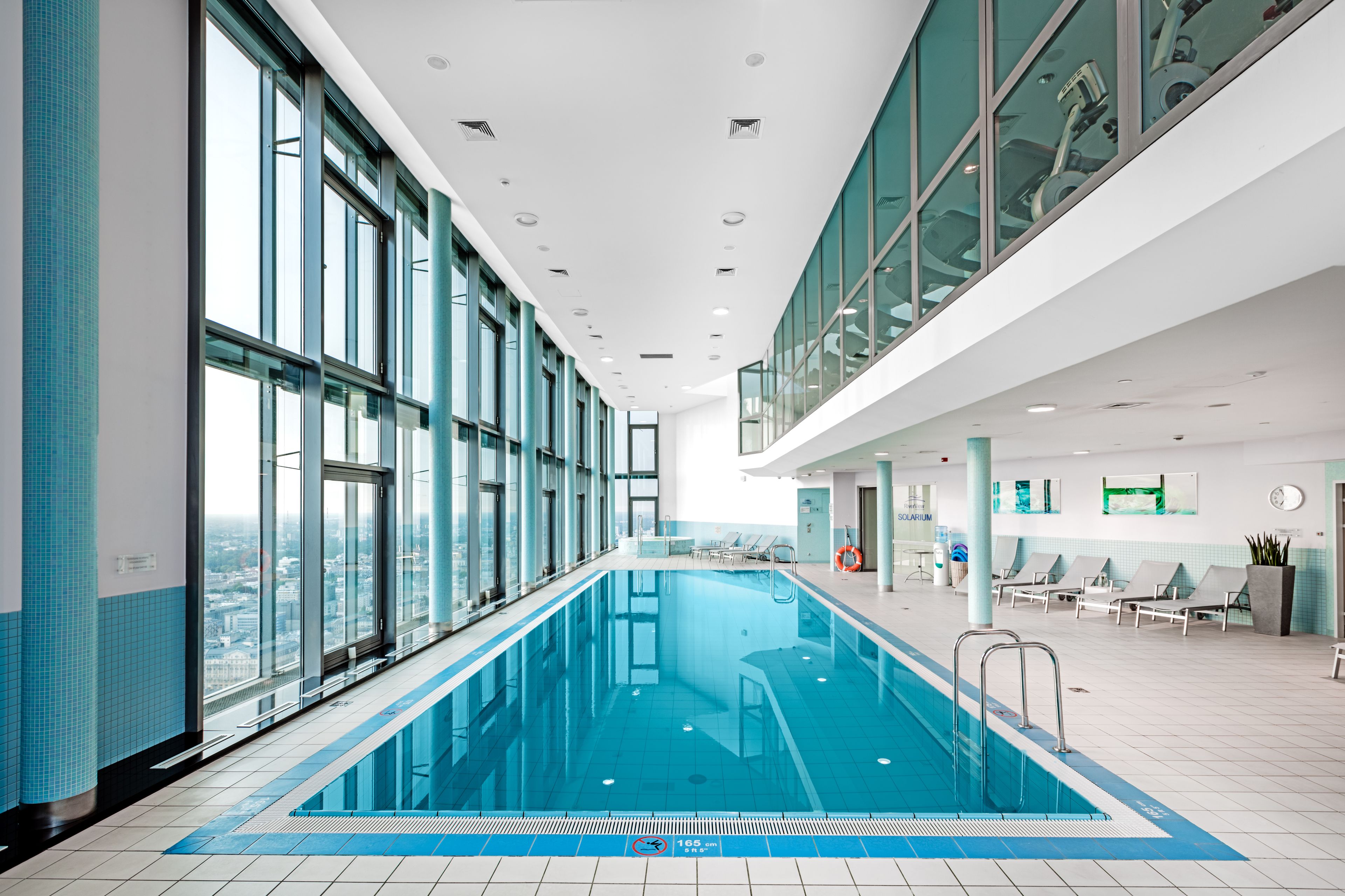 Indoor pool, open 7:00 AM to 10:00 PM, sun loungers