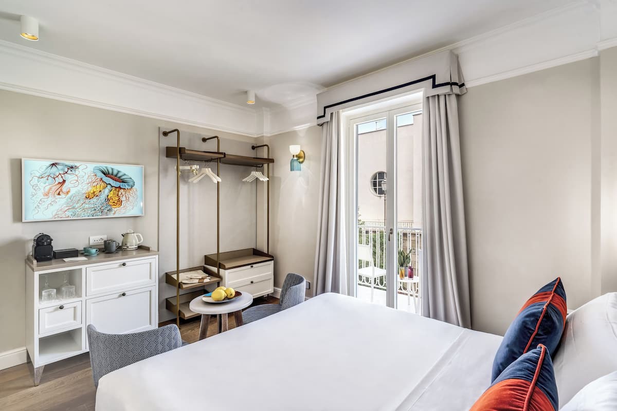 Economy Room | 1 bedroom, premium bedding, down comforters, minibar