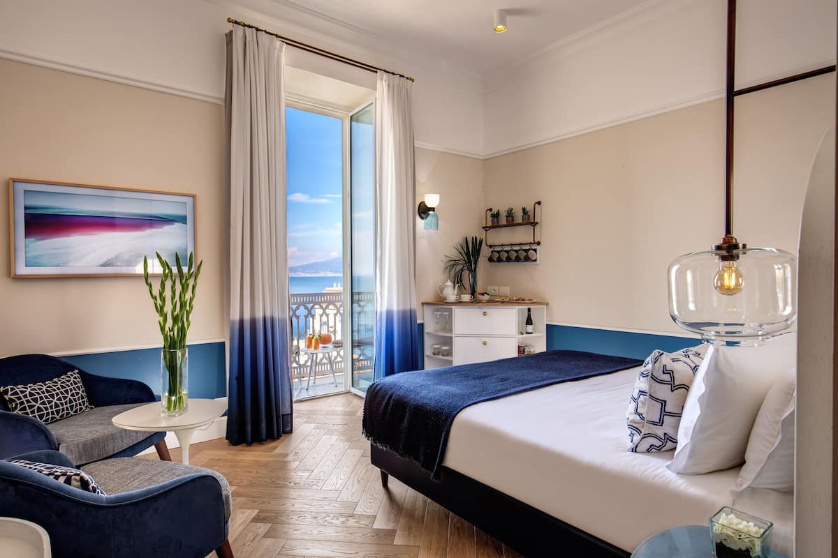 Deluxe Double Room, Balcony, Sea View | 1 bedroom, premium bedding, down comforters, minibar