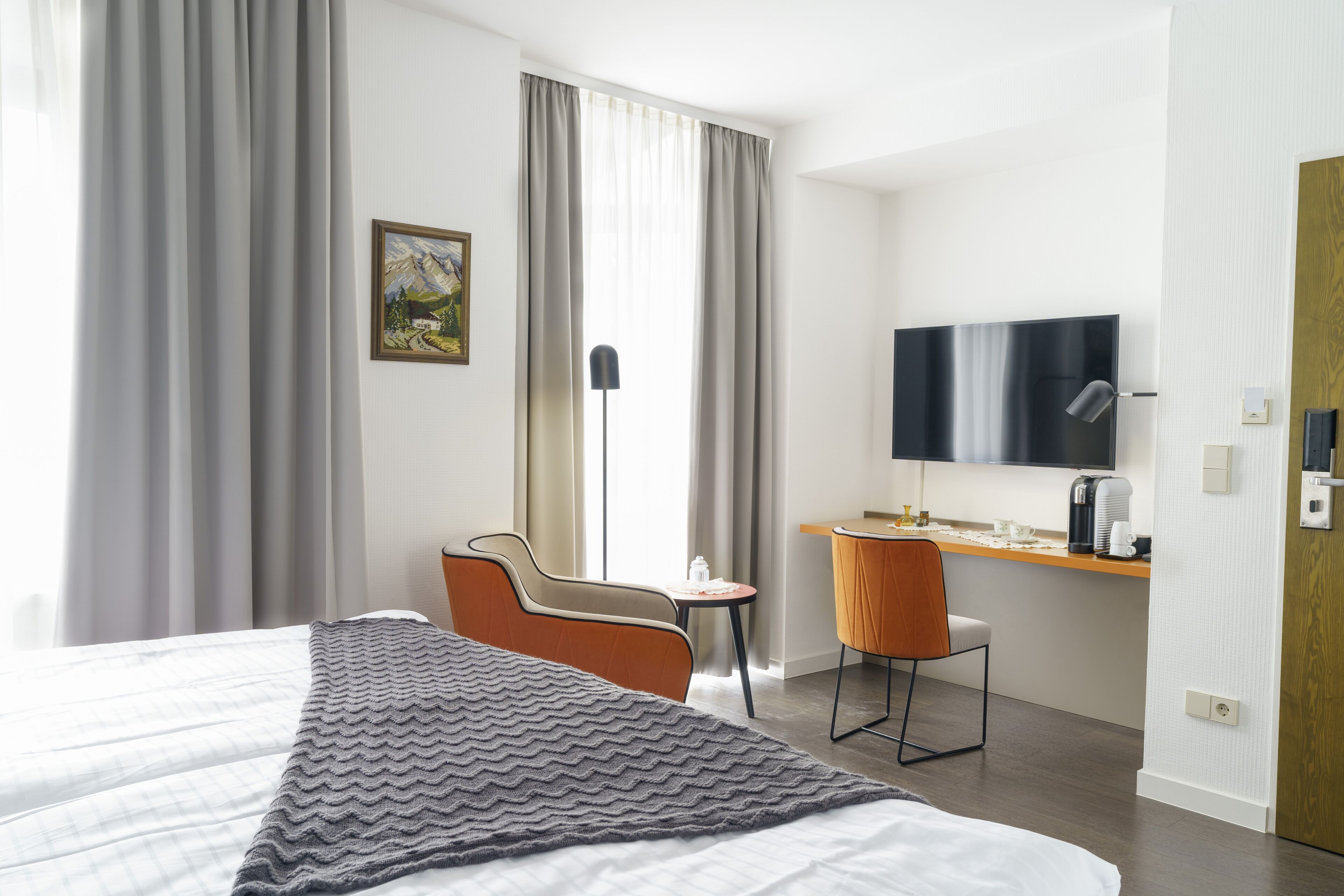 superior double room, non smoking, city view | living area | flat-screen tv