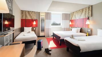 Premium bedding, desk, laptop workspace, blackout curtains