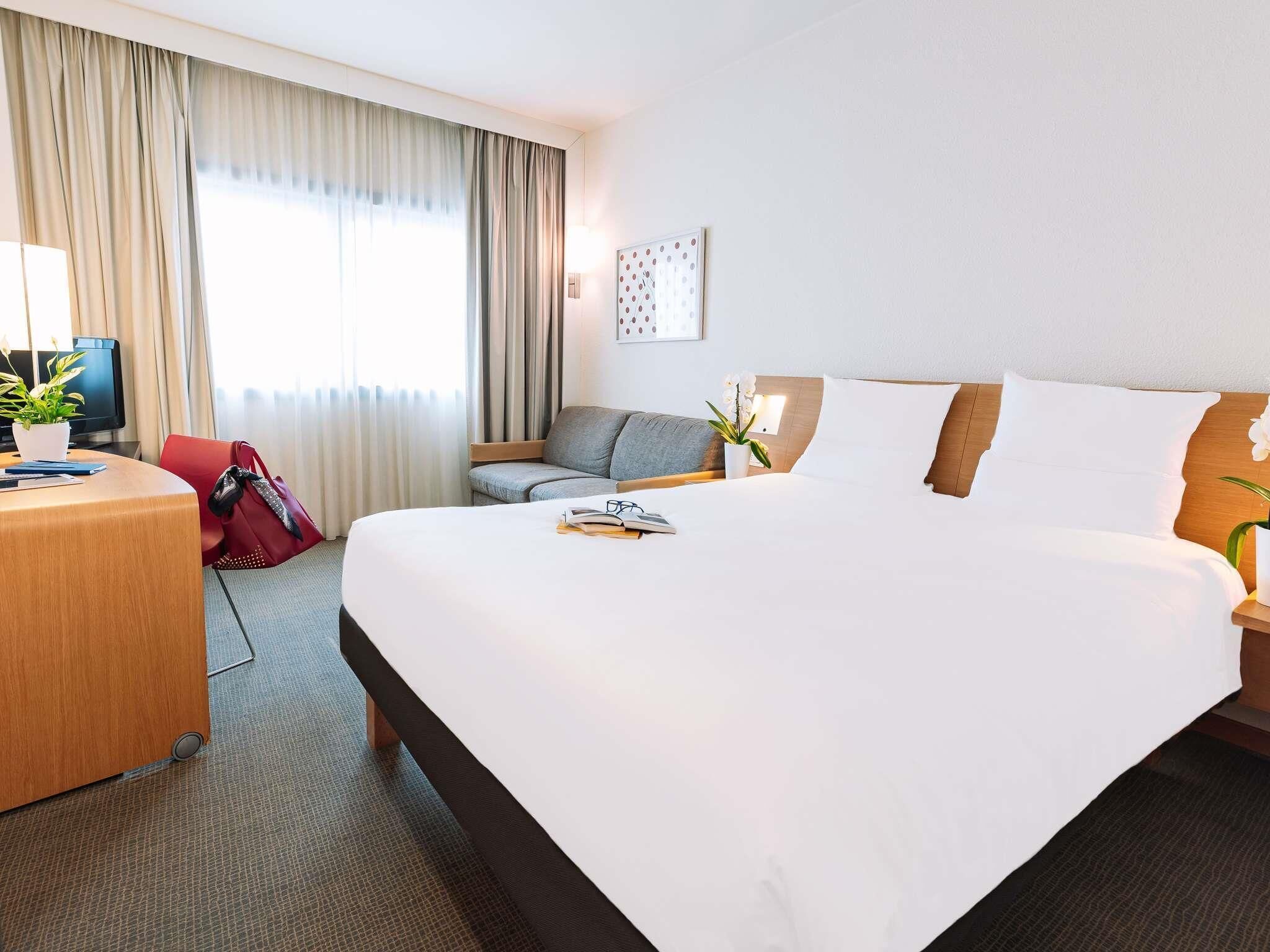 Premium bedding, down comforters, memory foam beds, minibar