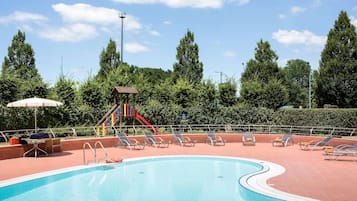 Seasonal outdoor pool, open 11:00 AM to 8:00 PM, pool umbrellas