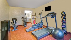 A gym with treadmills, elliptical machines, and a ball rack. - Days Inn by Wyndham Louisville Airport Fair and Expo Center (Louisville)