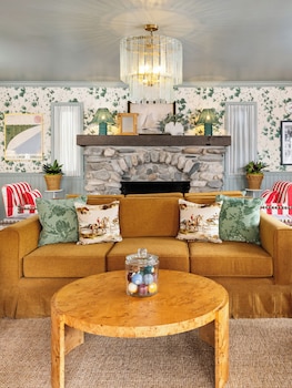 Sitting area in hotel lobby at Le Petit Pali at 8th Ave