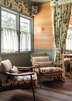 Sitting area in hotel lobby at Le Petit Pali at 8th Ave