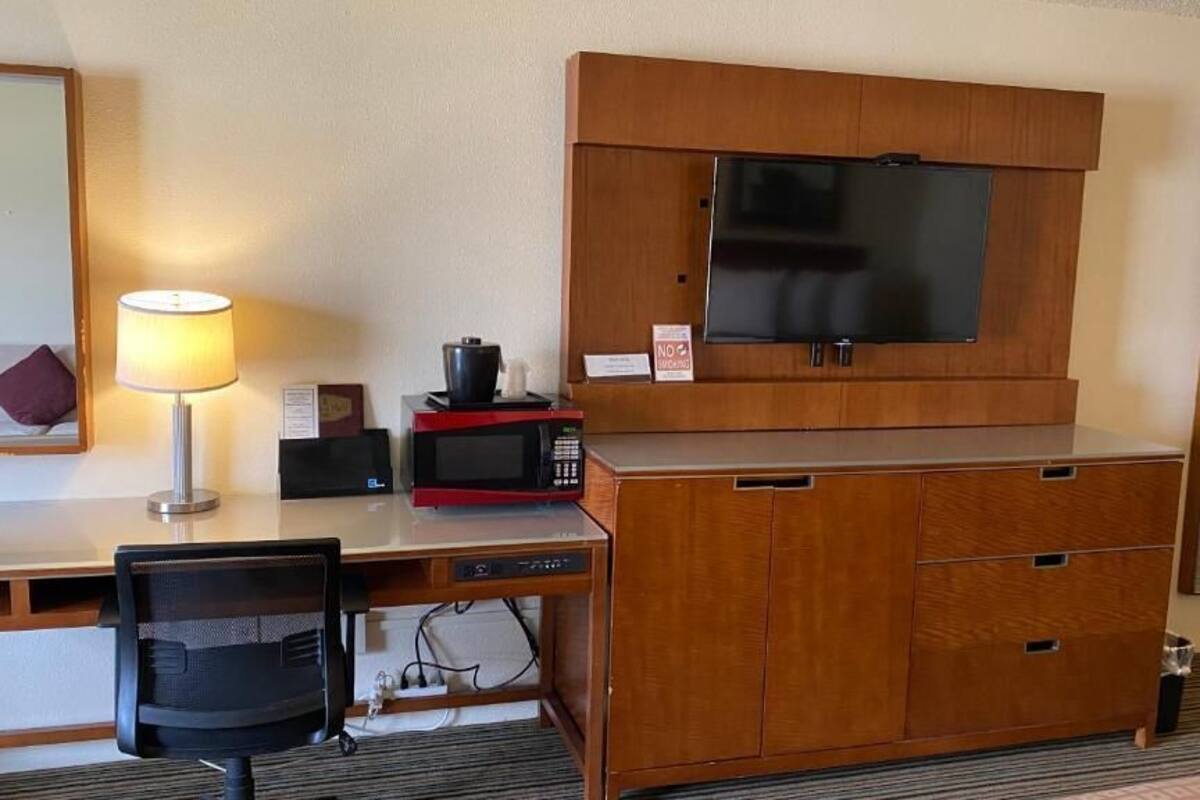 deluxe double room, 2 queen beds | 1 bedroom, desk, laptop workspace, iron/ironing board