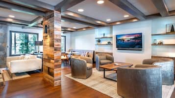 55-inch flat-screen TV with satellite channels, TV, streaming services