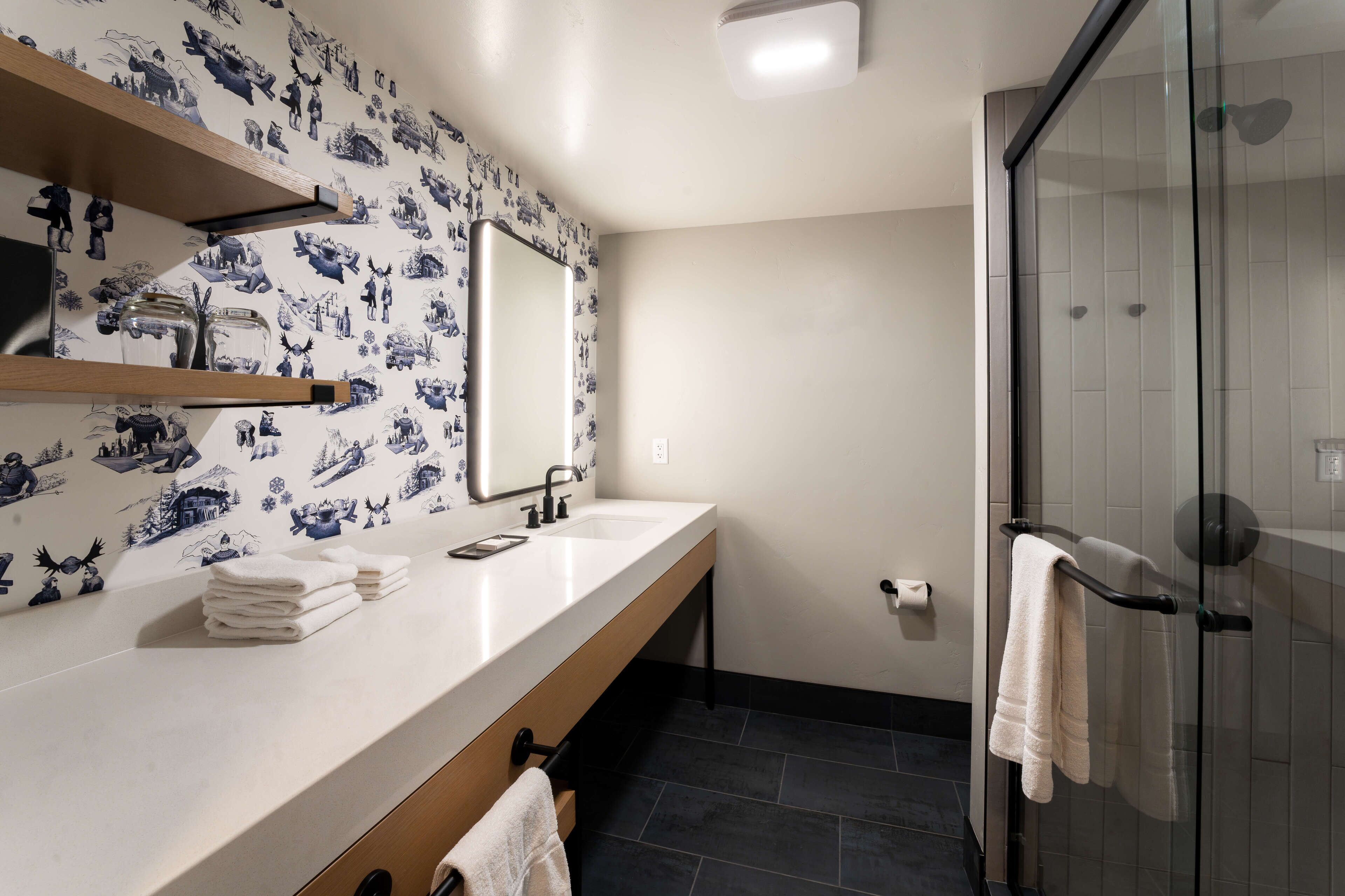 Signature Room, 1 King Bed | Bathroom | Shower, designer toiletries, hair dryer, towels