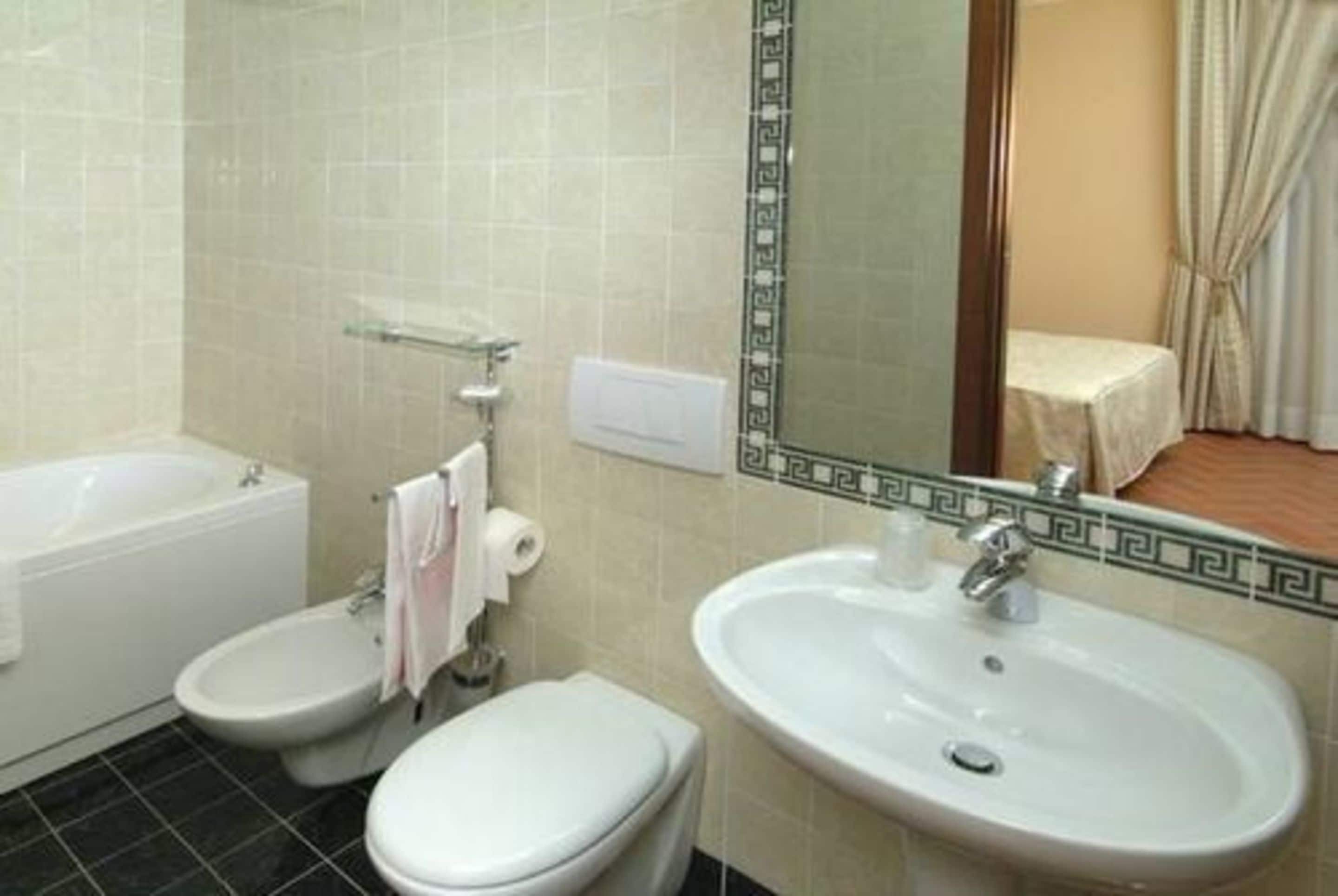 free toiletries, hair dryer, bidet, towels