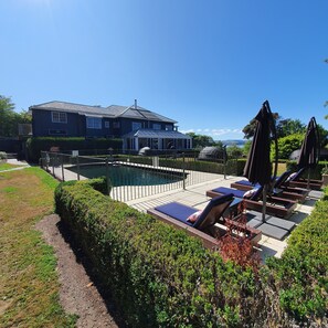 Outdoor pool, pool umbrellas, pool loungers