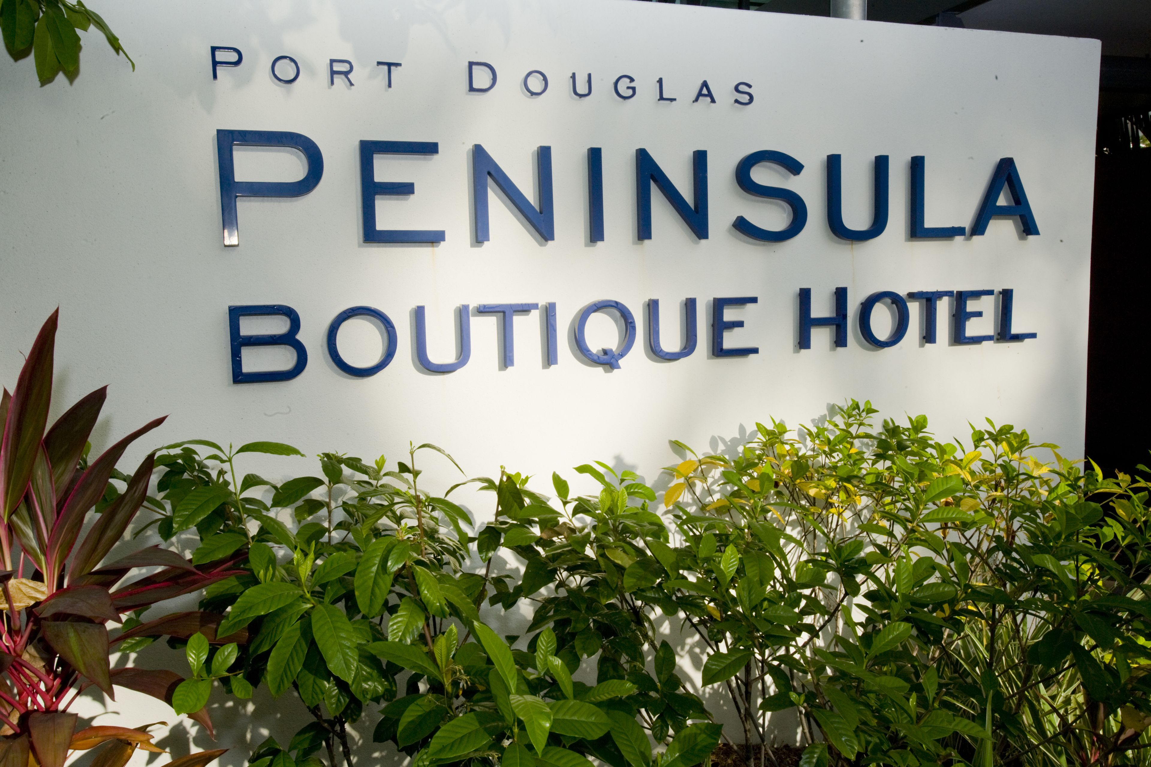 A sign for the Peninsula Boutique Hotel.